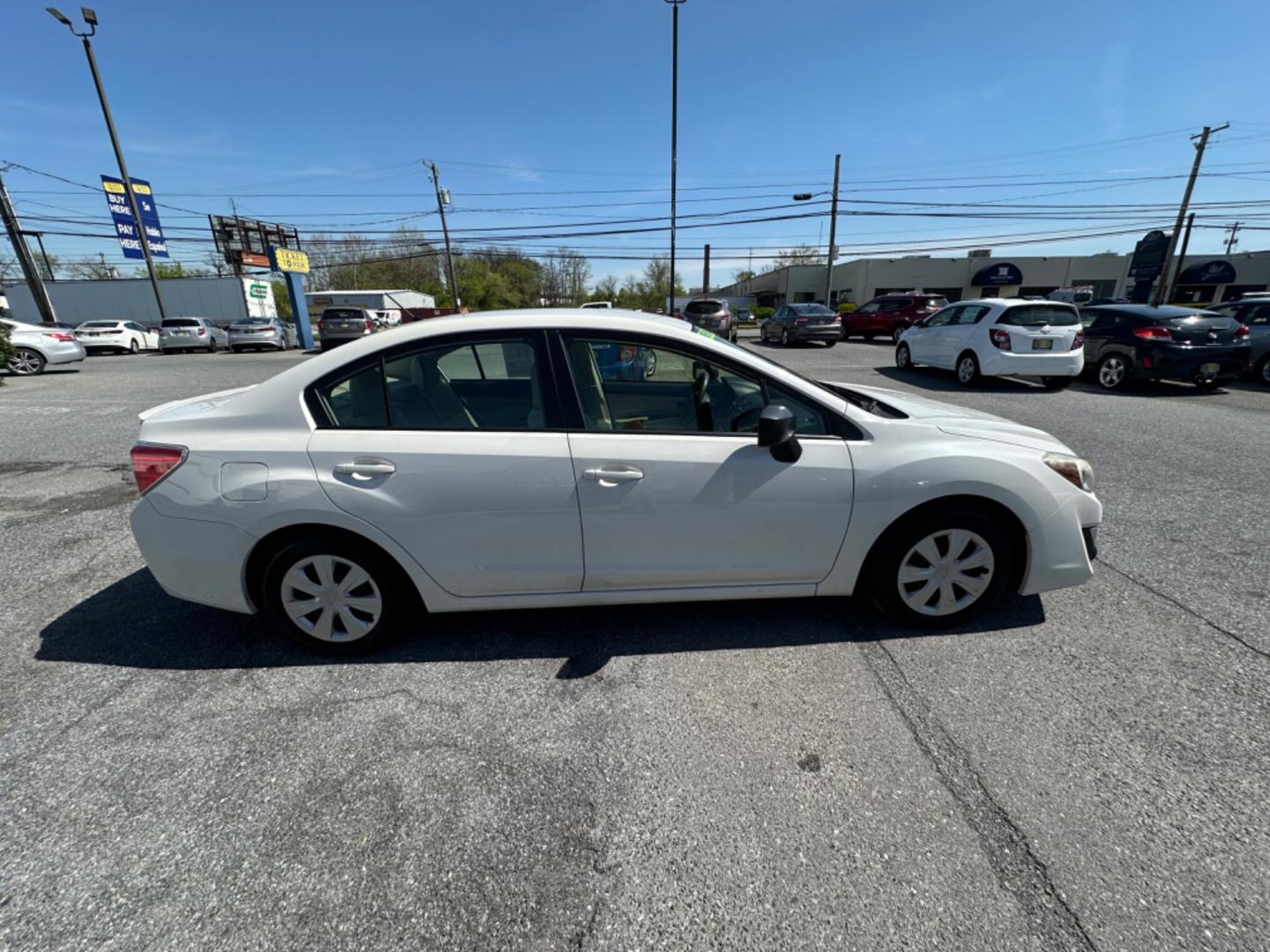 2016 WHITE Subaru Impreza 2.0i PZEV CVT 4-Door (JF1GJAA68GH) with an 2.0L H4 DOHC 16V engine, CVT transmission, located at 1254 Manheim Pike, Lancaster, PA, 17601, (717) 393-9133, 40.062870, -76.323273 - Photo#3